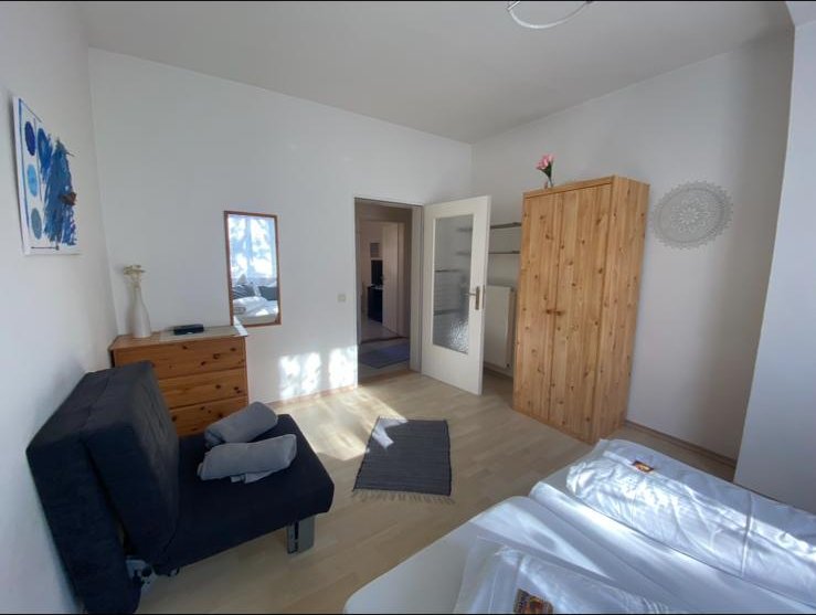 Schlafzimmer mit Sitzecke