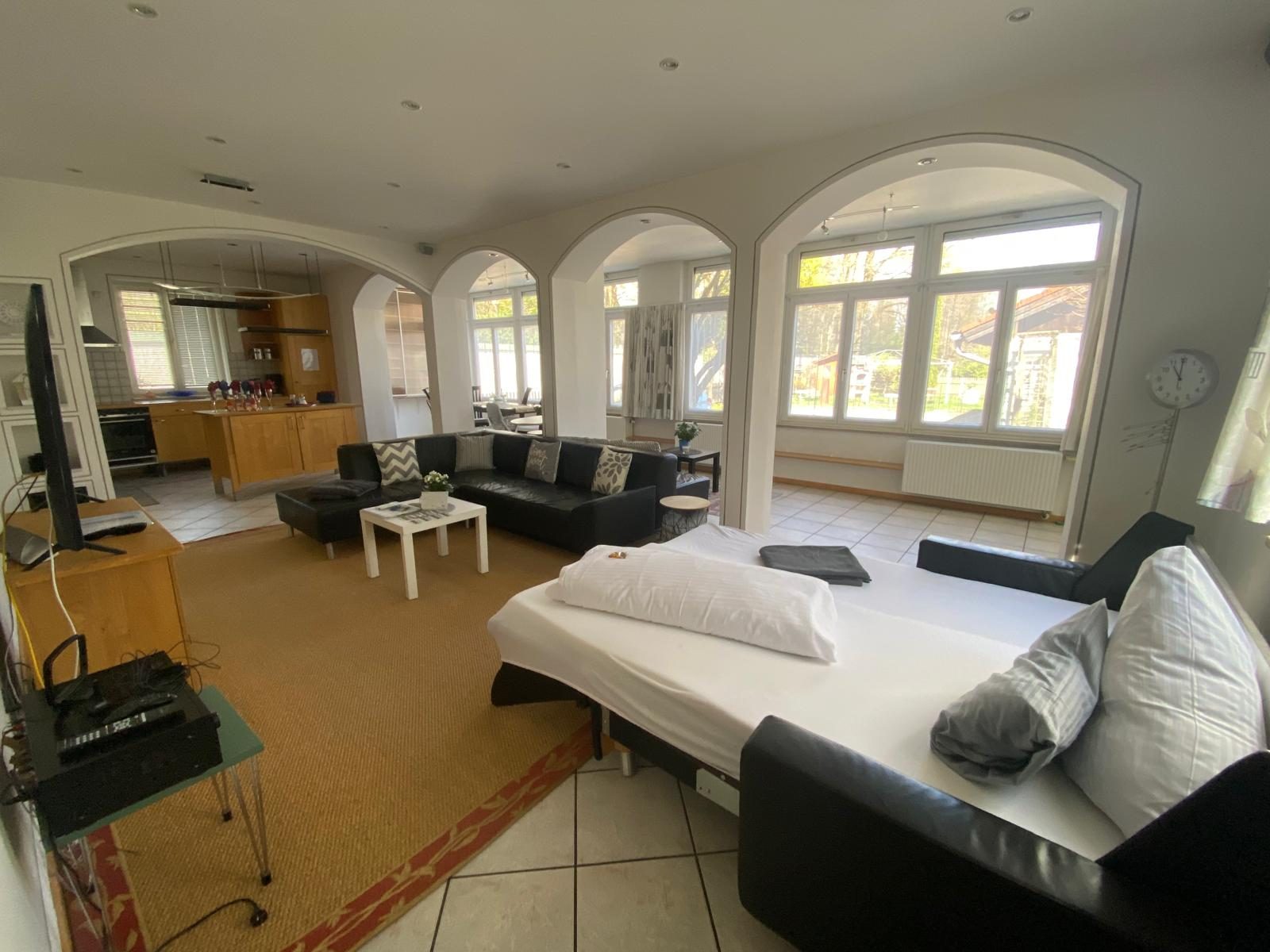 Wohnzimmer mit Schlafsofa für 7. und 8. Person